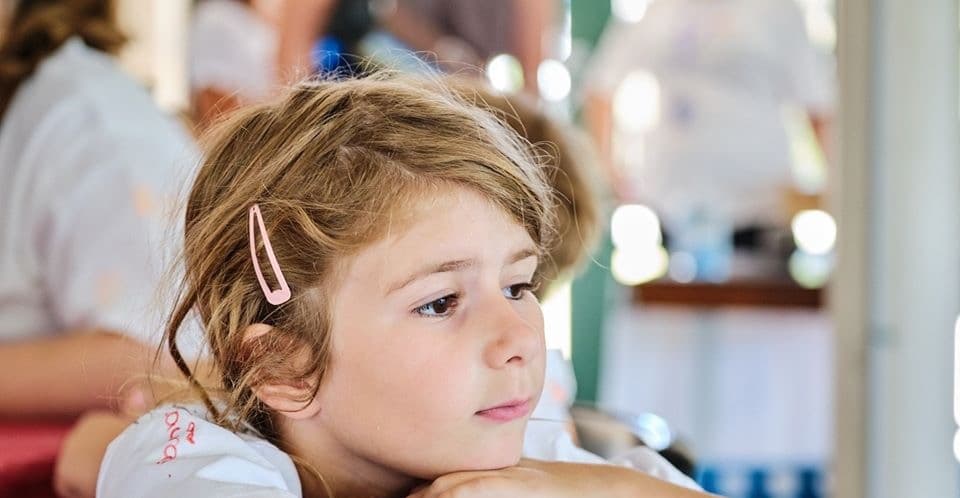 child participating in grief support activity at Lionheart